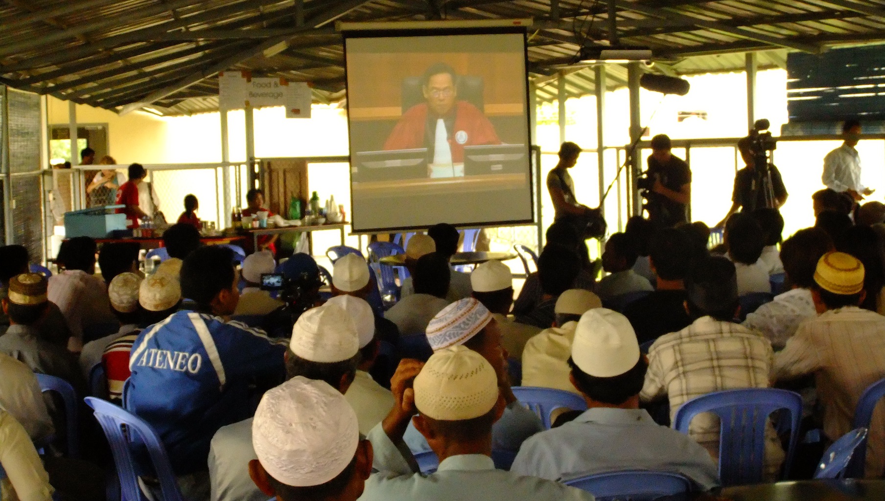 Cham Muslims listen to the Duch verdict at the ECCC (July 2010)